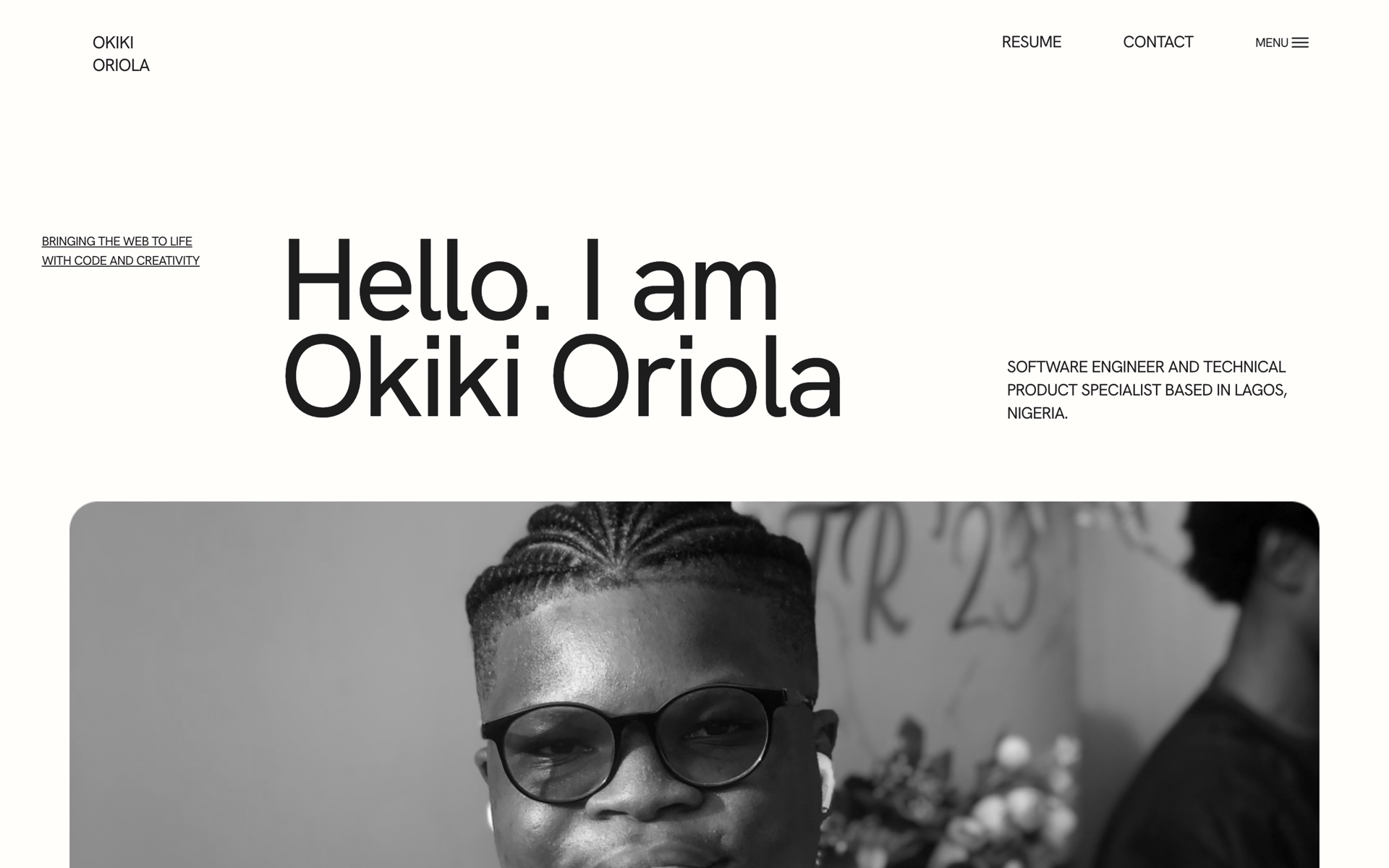 Okiki Oriola portfolio homepage with the software engineer introduction and grayscale portrait